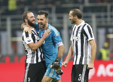 Gonzalo Higuain celebrates with Gianluigi Buffon and Giorgio Chiellini.