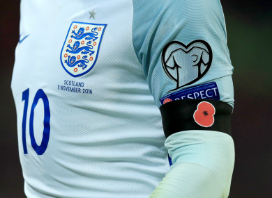 Former England captain Wayne Rooney wearing a poppy armband in 2016.
