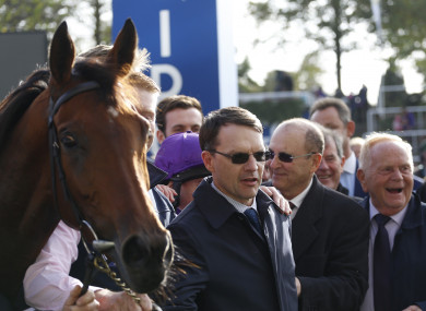 Trainer Aidan O'Brien (centre) after Hydrangea won The QIPCO British Chahamions Fillies & Mares Stakes Race run.