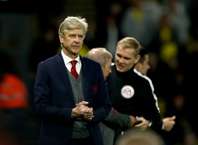 Arsenal manager Arsene Wenger appears dejected during the Premier League match at Vicarage Road.