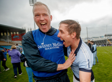 Na Piarsaigh manager Shane O'Neill celebrates with defender Niall Buckley.