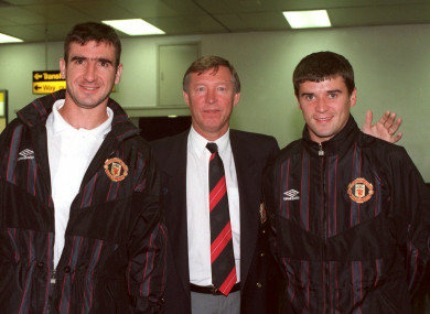 Eric Cantona (left) and Roy Keane (right) pose with Alex Ferguson.