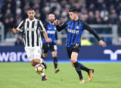Inter's Matias Vecina is chased by Sami Khedira.