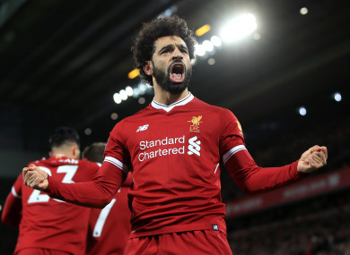 Mo Salah celebrates scoring.