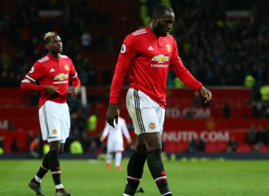 Man United players show their disappointment during today's game.