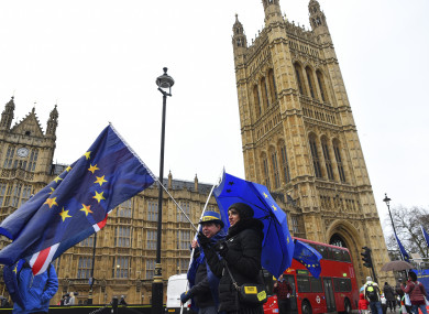 Demonstrators gathered to protest against Brexit, outside the Parliament with EU and Union flag yesterday.