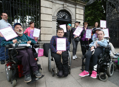 Protesters outside Leinster House last year who claim the government has broken its promises to disabled people by not ratifying the UN Convention on Rights for Disabled people.