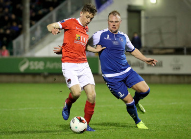 Connor Ellis under pressure from Robbie Williams while playing for Cork City against Limerick last March.