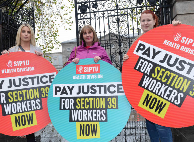 SIPTU members Liz Cloherty, Maria Power and Stephanie Lee calling on Government to give Section 39 workers’ pay justice outside Leinster House in November.