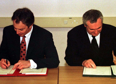 Former Taoiseach Bertie Ahern and former British Prime Minister Tony Blair signing the peace agreement in 1998.