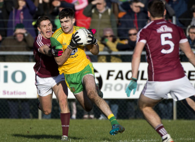 Donegal's Caolan McGonagle and Galway's Shane Walsh.
