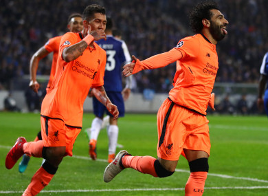 Liverpool stars Roberto Firmino and Mohamed Salah.
