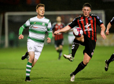 Bohs goalscorer Dan Casey with Rovers striker Gary Shaw.