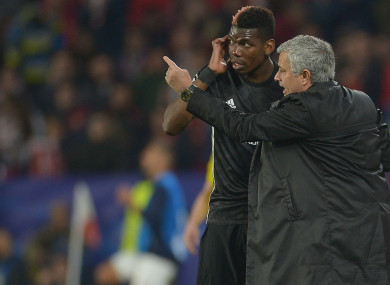 Manchester United midfielder Paul Pogba and Jose Mourinho.