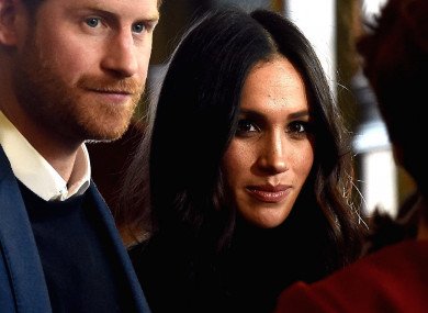 Prince Harry and Meghan Markle at a reception in Edinburgh.