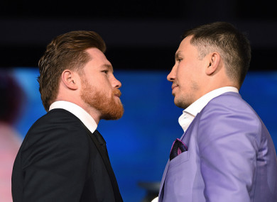 Boxers Canelo Alvarez (L) and Gennady Golovkin face off during a news conference.