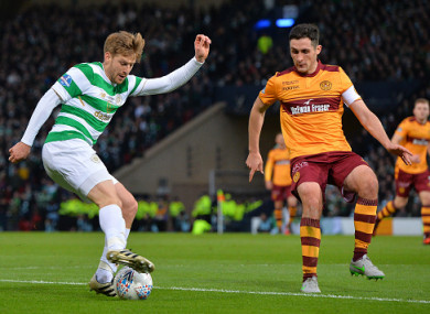 Stuart Armstrong alongside Motherwell captain Carl McHugh.