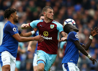 Burnley striker Chris Wood battles for the ball