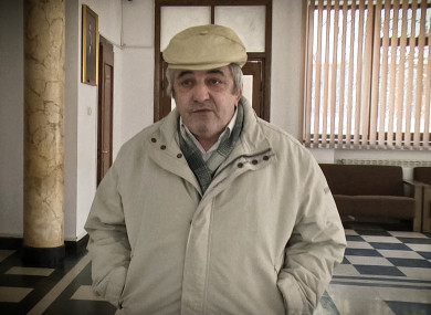 onstantin Reliu speaks to media in outside a court in Vaslui, northern Romania.