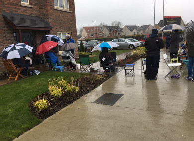 People queuing overnight in the rain to secure a house in Dublin 15.