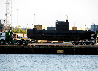 The Nautilus is taken from the water last August.
