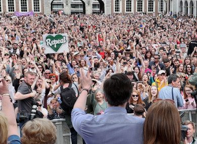 Simon Harris and Leo Varadkar on stage at Dublin Castle yesterday.