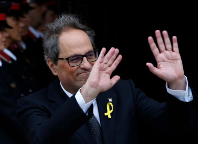 Newly appointed Catalan President Quim Torra leaves parliament today in Barcelona, Spain.