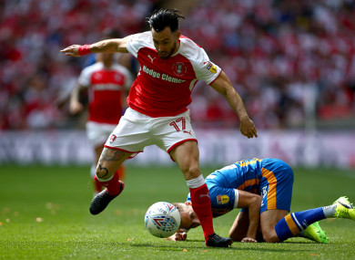 Rotherham United's Richie Towell evades Alex Rodman of Shrewsbury Town during Sunday's League One play-off final.
