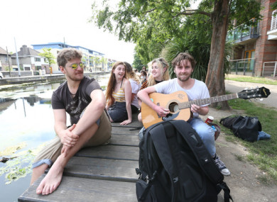 ictured are (LtoR) Seb Mahon, Grainne O'Toole, Kate Beatty and Darragh Ashe-Bowden enjoying the sunshine and hot weather along Dublin's canals, after Met Eireann issued a status yellow high-temperature warning as a potentially record-breaking heatwave hits Ireland this week.