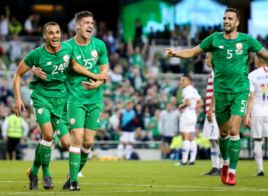 Graham Burke celebrates his goal with Darragh Lenihan.