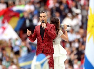 Robbie Williams performs at the opening ceremony.