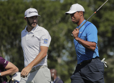 Dustin Johnson and Tiger Woods during a practice round on Tuesday.