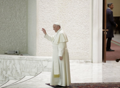 Pope Francis leaves after an audience with an association of people honored by the Italian Presidency at the Vatican.