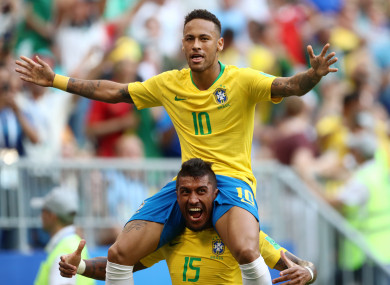 Brazil's Neymar (centre) celebrates scoring his side's first goal of the game.