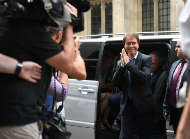 Cliff Richard arrives at the Rolls Building in London to hear the ruling of the dispute that he has with the BBC.