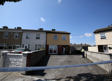 Gardaí at the house where the man was found on Friday evening.