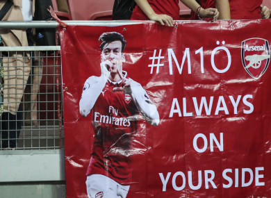 Arsenal fans show their support for Mesut Ozil during the International Champions Cup match between Arsenal and Atletico Madrid.