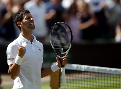 Novak Djokovic celebrates his win against Kei Nishikori on day nine of the Wimbledon Championship.