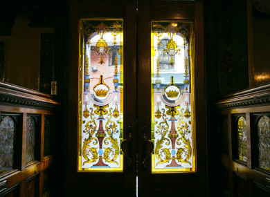 A doorway at the Crown in Belfast, with snugs on either side