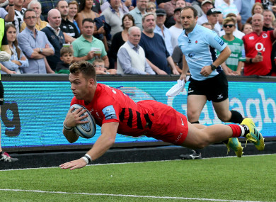 Alex Lewington goes over for a Saracens try.