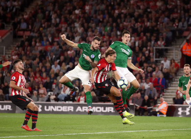 Brighton & Hove Albion's Shane Duffy (centre left) scores his side's first goal.