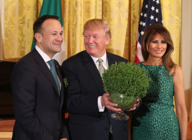 Taoiseach Leo Varadkar presents US President Donald Trump with a bowl of shamrock at the White House.