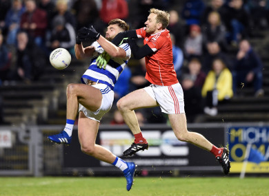 Aidan O'Shea contests a high ball with Cathal Hallinan.
