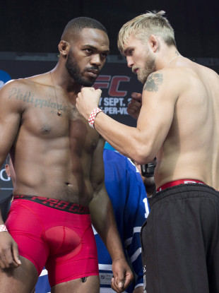 Jon Jones and Alexander Gustafsson squaring off at the weigh-in for their fight at UFC 165.