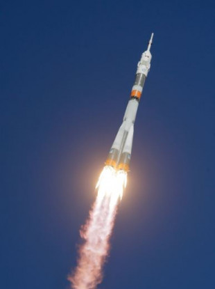 The Soyuz-FG rocket booster with Soyuz MS-10 spaceship taking off from Kazakhstan today.