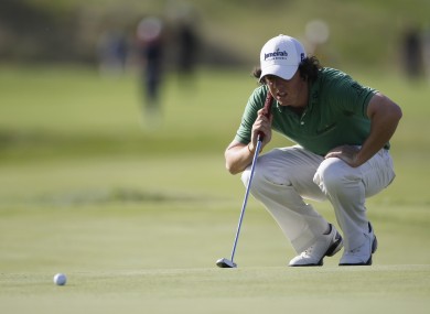 McIlroy of Northern Ireland lines up a putt during the final round of the PGA Championship golf tournament