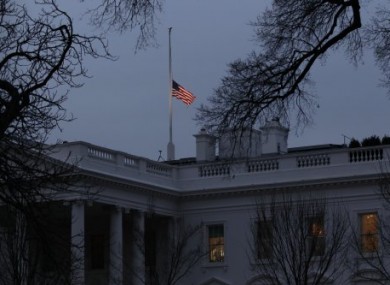 As ordered by President Obama, the American flag flies at half-staff at dawn over the White House in observance of the victims of Saturday's shooting in Tucson.
