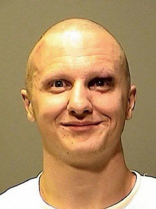 Mugshot photo released by the Pima County Sheriff's Office of shooting suspect Jared Loughner.