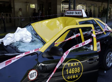 The taxi driven by Buenos Aires man Miguel Cajal, upon which a woman landed as she attempted suicide by jumping from 23 storeys.