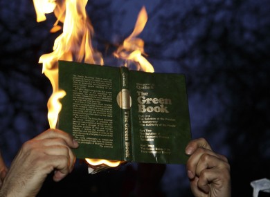 Libyan protesters at the US Embassy burnt copies of Colonel Muammar Gaddafi's Green Book - the leader's 1975 political manifesto.